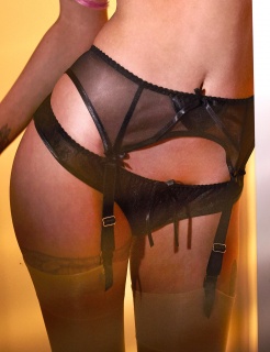 Kirsty Doll wears sheer black suspender belt